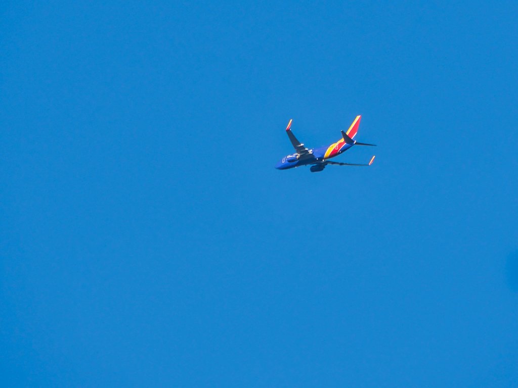 Airplane-Blue-Sky-Lumix-100-300.jpeg